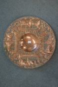 John Pearson, good large circular charger embossed with Viking ships, signed and dated to the
