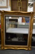 Two gilt picture frames, rebate sizes 81cm x 65cm and 67cm x 47cm.