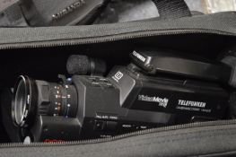 A Nikon camera with accessories and a Telefunken video camera etc.