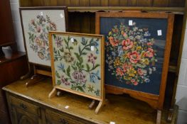 Three embroidered fire screens.