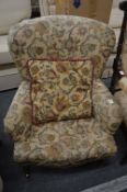Victorian style upholstered armchair.