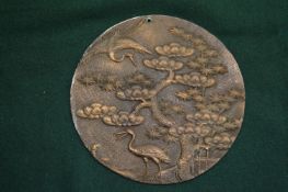 Japanese circular bronze plaque.