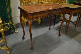 A very good pair of mahogany card tables in the Georgian style, the folding rectangular tops