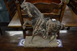 A large carved hard stone Tang style horse.