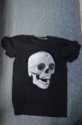 A Damien Hirst crystal skull T shirt, size small/medium.