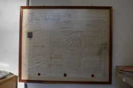 A framed and glazed indenture.