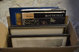 A small group of prints and books.