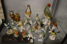 A collection of porcelain figures of birds.