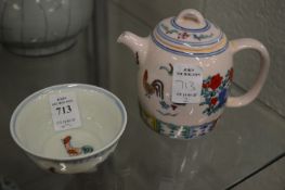 A Chinese Doucai porcelain chicken cup and similar teapot.