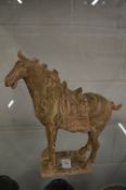 A Chinese Tang style horse with agate style decoration.