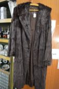 A ladies fur coat.