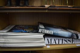 Matisse, a large coffee table book and various other art related books.