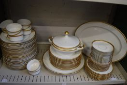 A quantity of Bavarian porcelain dinnerware with gilded rims.