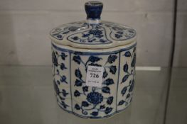 A Chinese blue and white floral decorated jar and cover.