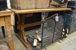 An oak refectory style dining table.