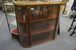 A good French mahogany and ormolu mounted hanging display cabinet with single glazed door, glazed