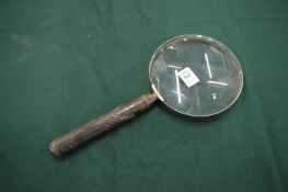 A large magnifying glass.
