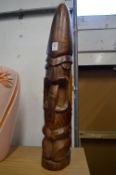 A carved wood totem.