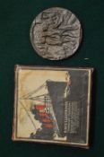 An R.M.S. Lusitania medal, boxed.