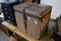 Moynat, Paris, a metal and leather bound canvas travelling trunk with internal lift out tray,