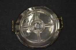 A plated and cut glass hors-d'oeuvre dish.