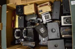A quantity of early cameras.