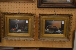 Still life of books and a vase together with another similar, both in decorative gilt frames.