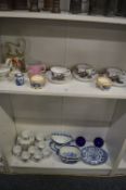 Quantity of 19th century and later porcelain to include three cups and saucers depicting Charity
