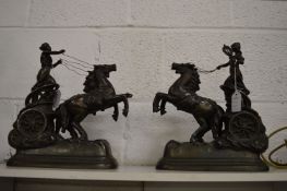 A good pair of cast spelter figure groups depicting chariots and horses with female riders.