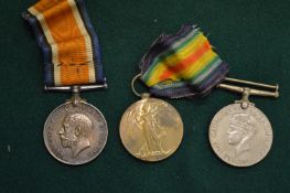 Three military medals to include a 1914-1918 medal presented to 217282 Private A Howell R.A., The