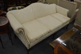 A good Georgian design cream upholstered humpback scroll-end three seater settee.