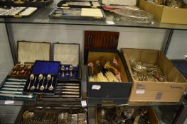 A cased set of six silver coffee spoons and other cased and loose flatware.