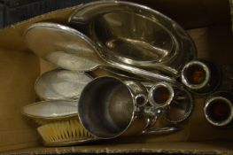A silver plated dressing table set and other items.