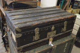 A large travelling trunk.