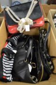 A quantity of Lulu Guinness handbags.