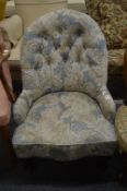 A Victorian button upholstered nursing chair.