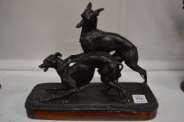 After Mene, cast spelter figure of two whippets.