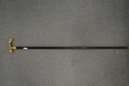 A gilt metal mounted horn walking stick.