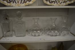 Cut glass decanters and carafes.