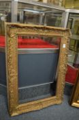 Two gilt picture frames, rebate sizes both 61cm x 41cm.