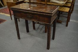 A good Chippendale period mahogany rectangular fold-over combination tea and card table.