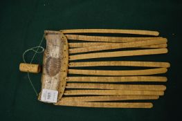 A carved bone wind chime.