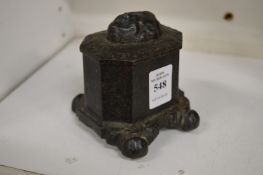 An early cast iron inkwell or match holder.