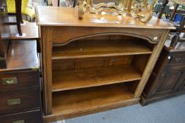 An oak open bookcase.