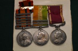 A group of three military medals to include a Victorian South Africa medal with five bars