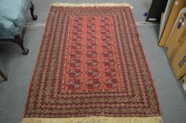A Persian Bokhara style rug, 177cm x 127cm.
