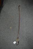 A cello bow stamped Simpson, Birmingham, one end repaired.