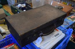 A small leather case.