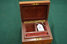 A leather jewellery box.