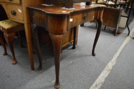 An 18th century walnut single drawer side table (faults).